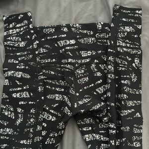 New- without tags. Lululemon full length black and white leggings.